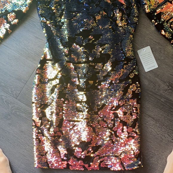 New with tags party dress. This dress is stunning and never been worn. - Picture 3 of 9